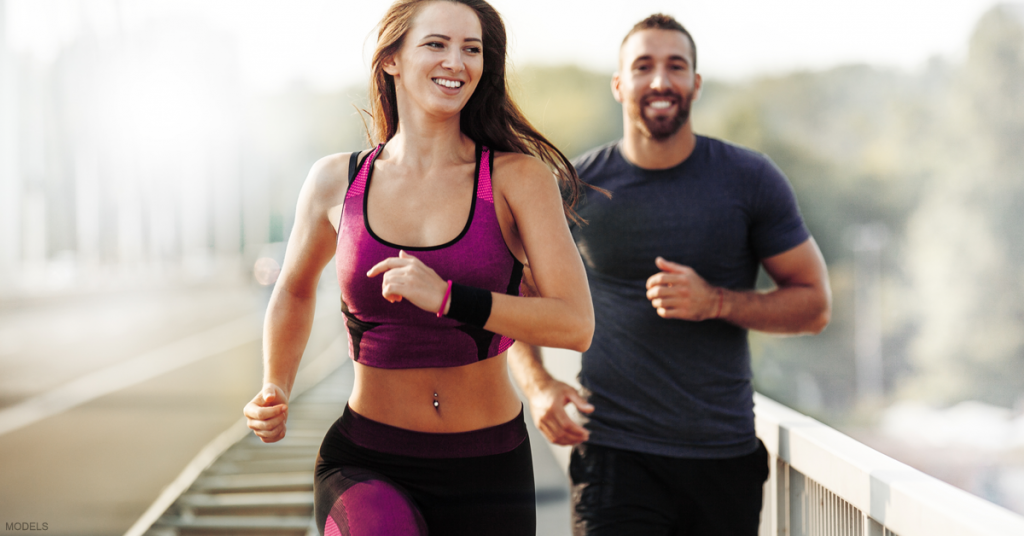 A woman and man go on a jog to prepare for their liposuction procedures.