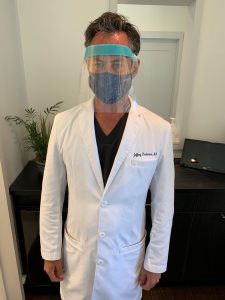 Dr Jeffrey Rockmore wearing PPE