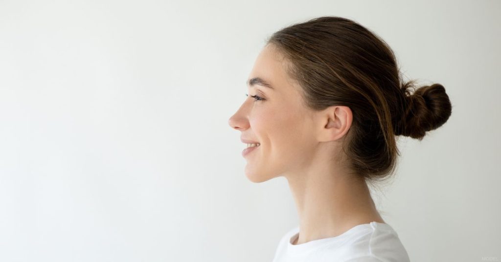 Smiling woman side profile (model)
